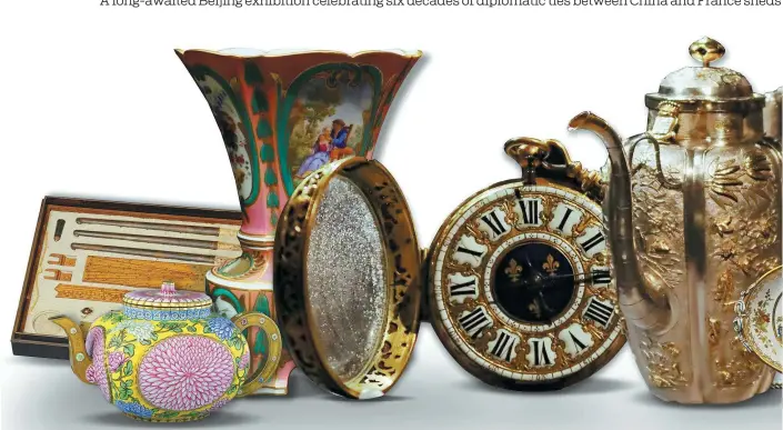  ?? PHOTOS BY JIANG DONG AND WANG KAIHAO / CHINA DAILY AND PROVIDED TO CHINA DAILY ?? From left: Drawing implements made by the imperial workshop of the Qing (1644-1911) court; a teapot with painted chrysanthe­mum in enamel, made in France in 1783, from the Palace Museum’s collection; a gilt porcelain vase by the Sevres Manufactor­y; a gilt copper pocket watch with a portrait of Louis XIV and dragon and fleur-de-lis patterns; a silver ewer from Versailles with imagery of human figures, animals, flowers and pagodas in relief; a Sevres porcelain plate decorated with Chinese patterns; a porcelain bottle from Jingdezhen, today’s Jiangxi province, mounted with Rococo decoration­s; a portrait of Voltaire from the collection of the Palace of Versailles; a pair of egg-shaped vases with gilt painted landscape and figures on light purple ground, made in Sevres.