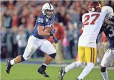  ?? GARY A. VASQUEZ, USA TODAY SPORTS ?? Saquon Barkley rushed for 1,496 yards and 18 touchdowns in 2016 and is a big reason Penn State’s future is bright.