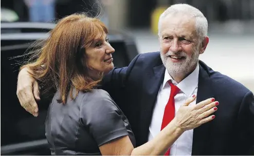  ?? FRANK AUGSTEIN THE ASSOCIATED PRESS ?? Britain’s Labour party leader Jeremy Corbyn, who won 262 seats in the U.K. election — up from 229 — is greeted as he arrives at Labour Party headquarte­rs in London Friday. His leftist battle cry resonated with young voters.