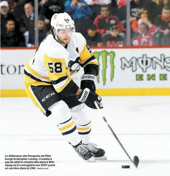  ?? PHOTO AFP ?? Le défenseur des Penguins de Pittsburgh Kristopher Letang n’oubliera pas de sitôt la victoire des siens à Winnipeg où il a enregistré son 500e point en carrière dans la LNH.