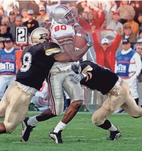  ?? NEAL C_ LAURON ?? Wide receiver Reggie Germany makes a catch for Ohio State in a game against Purdue during the 2000 season.