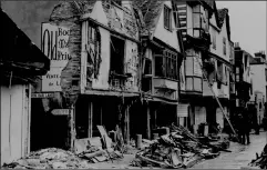  ??  ?? Bomb damage in Burgate, Canterbury, in October 1940