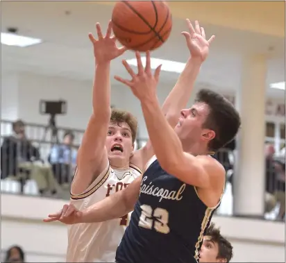  ?? PETE BANNAN – MEDIANEWS GROUP ?? Episcopal Academy’s Andrew Alikakos hits a shot against Haverford School’s MJ Atkins Tuesday afternoon.