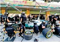  ?? AFP ?? Mechanics change tyres for Valtteri Bottas at the pit. —
