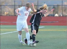  ?? AUSTIN HERTZOG - MEDIANEWS GROUP ?? Whitehall’s Nathaniel Walker and Boyertown’s Landon Wenger battle for the ball during a PIAA 4A first round game Tuesday.