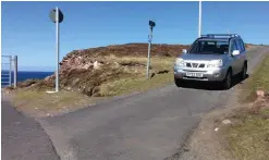  ??  ?? No-go zone: A 4x4 stops other drivers from using the road
