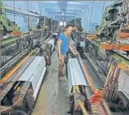  ?? VIJAYANAND GUPTA/HT ?? A worker at a textile mill in Surat.