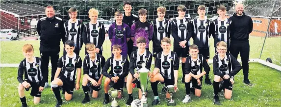  ??  ?? Garden Village Under-13s are pictured with the three trophies they won this season. The boys were proud to win the West Wales Cup, Holland Easter Tournament and the Swansea Junior League Cup. Coached by Eric Jones, Gary Moorhouse, Lucas Richards and Richie McCarley, the team are James Havard, Kian Harmen-Luff, Joseph Hier, Benjamin Morris, Harrison Moorhouse, Oliver Toshack, William Richards, Luke Evans, Rokko McCarley, Daniel Swinford, Kyle Hughes, Alfie Phillips, Bradley Burchell, Alfie Moruzzi-Jones, Rhys Richards and Jack Evans.