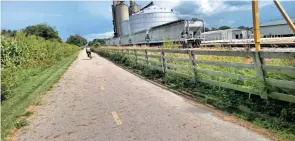  ?? ?? Ohio’s Camp Chase: On the western half of the trail you may see a train on the adjacent tracks being loaded with the bounty of the fields.