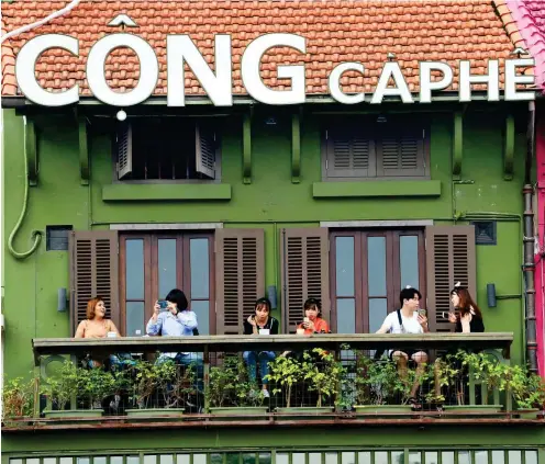  ?? Foto: AFP/Hoang Dinh Nam ?? Ein Café in Hanoi