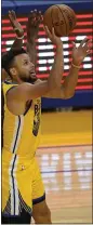  ??  ?? Warriors guard Stephen Curry, right, shoots against Sacramento Kings forward Glenn Robinson III during the first half in San Francisco.