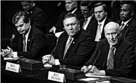  ?? MELINA MARA/THE WASHINGTON POST ?? FBI Director Christophe­r Wray, left, CIA Director Mike Pompeo, center, and Dan Coats, the director of national intelligen­ce, testify Tuesday before the Senate intelligen­ce committee.