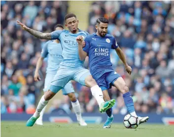  ?? — Reuters ?? Leicester City’s Riyad Mahrez in action with Manchester City’s Gabriel Jesus.