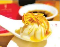  ??  ?? MANILA DEBUT Counterclo­ckwise from top left: Abba Napa, Jon Syjuco, and Eliza Antonino of The Moment Group; Xiao long bao kitchen at Din Tai Fung in Taipei; The proper way to eat xiao long bao is to dip it in soy-vinegar sauce and top it with ginger;...