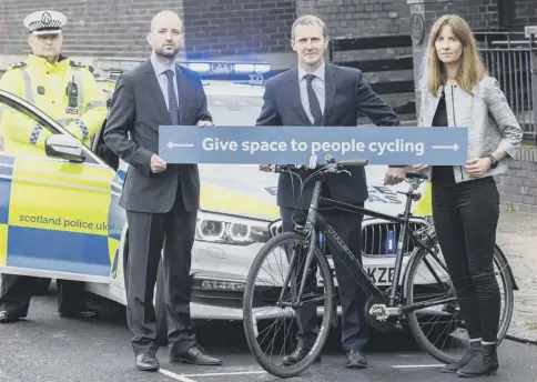  ??  ?? 0 Andrew Thomson, Keith Irving, Michael Matheson and Denise Hamilton at the launch of Cycling Scotland’s annual safety campaign