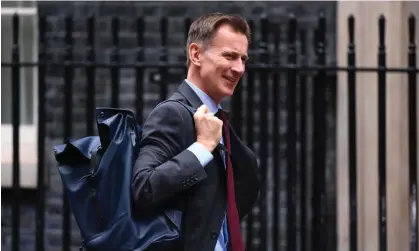  ?? ?? Hunt is looking at cuts to the £100bn-plus capital spending budget. Photograph: Neil Hall/EPA