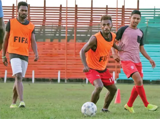  ?? Photo: Fiji FA Media ?? Labasa striker Siotame Kubu controls the ball away from midfielder Ashnil Raju during training at Subrail Park, Labasa, on October 20, 2020.