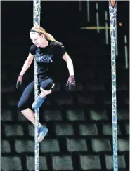  ?? [PHOTOS BY SARAH PHIPPS, THE OKLAHOMAN] ?? Above: Michelle Wuthrich practices Wednesday for Cirque du Soleil’s “Toruk — The First Flight,” which began performanc­es Wednesday in Oklahoma City. “We paint ourselves blue every night and put on our blue costumes … and it’s great,” Wuthrich said....