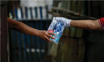  ??  ?? ‘We can – and must – be there for each other.’ Photograph: Rolex dela Peña/EPA