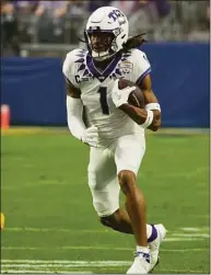  ?? Rick Scuteri / Associated Press ?? TCU wide receiver Quentin Johnston during the first half of the Fiesta Bowl against Michigan on Dec. 31 in Glendale, Ariz.