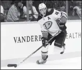  ?? Associated Press ?? ROAD WIN Anaheim Ducks defenseman Josh Manson (42) plays against the Nashville Predators during the second period of an NHL hockey game on Thursday in Nashville, Tenn.