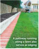  ??  ?? A pathway running along a lawn also serves as edging