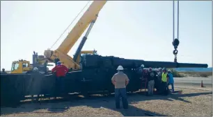  ?? LOANED PHOTO/ YUMA PROVING GROUND ?? WORKERS FROM YPG were using a crane on Friday morning to remove the barrel of the M65 Howitzer, or “Atomic Cannon,” in preparatio­n for transport to a maintenanc­e facility on base where it will be refurbishe­d to its original likeness.