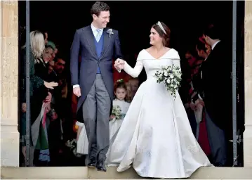  ??  ?? Princess Eugenie - the Duke of York's daughter marries Jack Brooksbank at Windsor Castle in a star-studded ceremony at Windsor. Mr Brooksbank is the second commoner to join the Royal Family this year/ Reuters