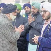  ??  ?? Chief Khalsa Diwan officiatin­g president Dhanraj Singh (left) expressing condolence­s to Harjit Singh Chadha, brother of former CKD vicepresid­ent Inderpreet Singh Chadha who committed suicide on Wednesday, at the mortuary in civil hospital, Amritsar,...