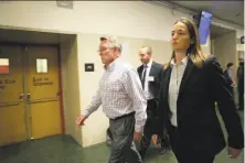  ?? Lea Suzuki / The Chronicle ?? Jim Steinle (left), Kate Steinle’s father, leaves the Hall of Justice on Oct. 23, the first day of the trial in her killing.