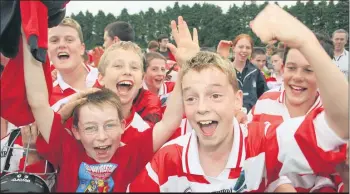  ?? (Pic: The Avondhu Archives) ?? Celebratio­n time for Ballygibli­n U13 hurlers after their replay win over Ballyhea in the North Cork championsh­ip final at Castletown­roche in 2005.