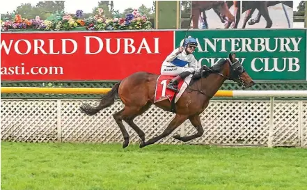  ?? RACE IMAGES SOUTH ?? Troy Harris celebrates as Catalyst takes out the 2000 Guineas at Riccarton on Saturday.