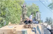  ?? AFP ?? In this Oct 18, 2019 file photo, Turkish-backed Syrian National Army fighters drive in Sanliurfa as they head for Tal Abyad in Syria.