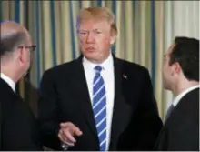  ?? THE ASSOCIATED PRESS ?? President Donald Trump pauses to speak to guests as he leaves the State Dining Room of the White House in Washington.