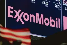  ?? Richard Drew / Associated Press ?? Exxon Mobil warned that its second quarter earnings could take a hit from weaker chemical margins and lower natural gas prices.