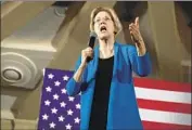  ?? Scott Olson Getty Images ?? THE CAMPAIGN press’ fixation on Sen. Elizabeth Warren’s ethnicity is not an error but a choice.