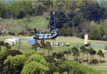  ?? (Lee Jong-hyeon/Reuters) ?? A TERMINAL HIGH Altitude Area Defense (THAAD) intercepto­r is seen in Seongju, South Korea, on Wednesday.