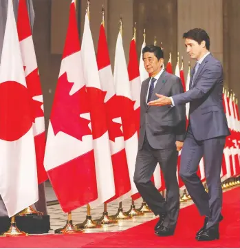  ?? PATRICK DOYLE / THE CANADIAN PRESS ?? Prime Minister Justin Trudeau hosts Japanese Prime Minister Shinzo Abe in Ottawa on Sunday. A new Leger poll has found that support for the Trudeau government has hit a new low just six months before the federal election.
