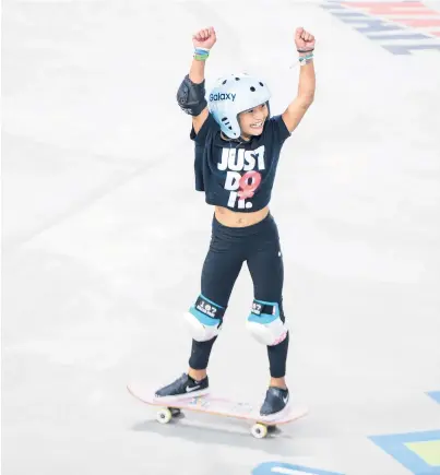  ?? NICOLENERI/ AP ?? Sky Brown, 11, celebrates during thewomen’s skateboard parkqualif­ier round at theXGames onAug. 2, 2019, inMinneapo­lis.