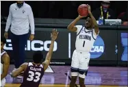  ?? MICHAEL CONROY - THE ASSOCIATED PRESS ?? Villanova guard Bryan Antoine (1) shoots over Winthrop forward Chase Claxton (33) in the second half of a first round game in the NCAA M Tournament game at Farmers Coliseum in Indianapol­is, Friday, March 19, 2021.