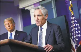  ?? Mandel Ngan / AFP via Getty Images ?? President Trump joins adviser Dr. Scott Atlas at a Sept. 23 briefing at the White House. Atlas clashed with top government scientists as he resisted stronger efforts to contain the pandemic.