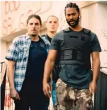  ?? AMAZON STUDIOS ?? Damien Bonnard (from left), Alexis Manenti and Djebril Zonga play cops trying to keep the peace in a volatile housing project in “Les Miserables.”