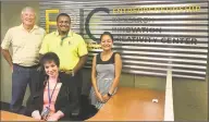  ?? Chris Bosak / Hearst Connecticu­t Media ?? Standing, from left, Paul Loftus, Lloyd Barker, Anju Gautam and Pauline Assenza, seated, at ERIC @ The Garage, an entreprene­urial center Western Connecticu­t State University in Danbury.