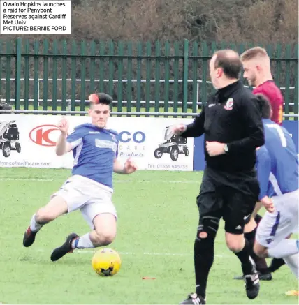  ??  ?? Owain Hopkins launches a raid for Penybont Reserves against Cardiff Met Univ PICTURE: BERNIE FORD