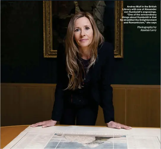  ?? Photograph­y by
Alastair Levy ?? Andrea Wulf in the British Library with one of Alexander von Humboldt’s engravings.
“One of the extraordin­ary things about Humboldt is that he straddled the Enlightenm­ent
and Romanticis­m,” she says