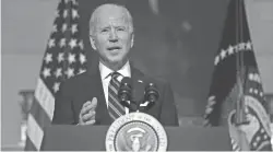  ?? EVAN VUCCI/AP ?? President Joe Biden on Thursday turned his focus to health care, with orders to reopen government insurance markets for new enrollment­s.