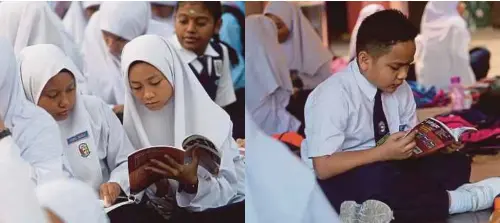  ??  ?? CALON UPSR mengulang kaji sebelum memasuki dewan peperiksaa­n di Sekolah Kebangsaan Puchong Utama 2.