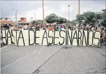  ?? ERNESTO GUZMÁN / EFE ?? Cali. Protesta por la masacre de cinco menores de edad en 2020.