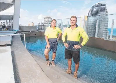  ??  ?? Father and son team Jeff and Jaye Hearn atop The Darling at Broadbeach.