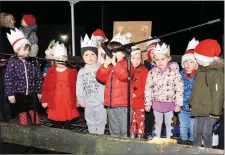  ??  ?? Children performing at the turning on of christmas Lights in Collooney.